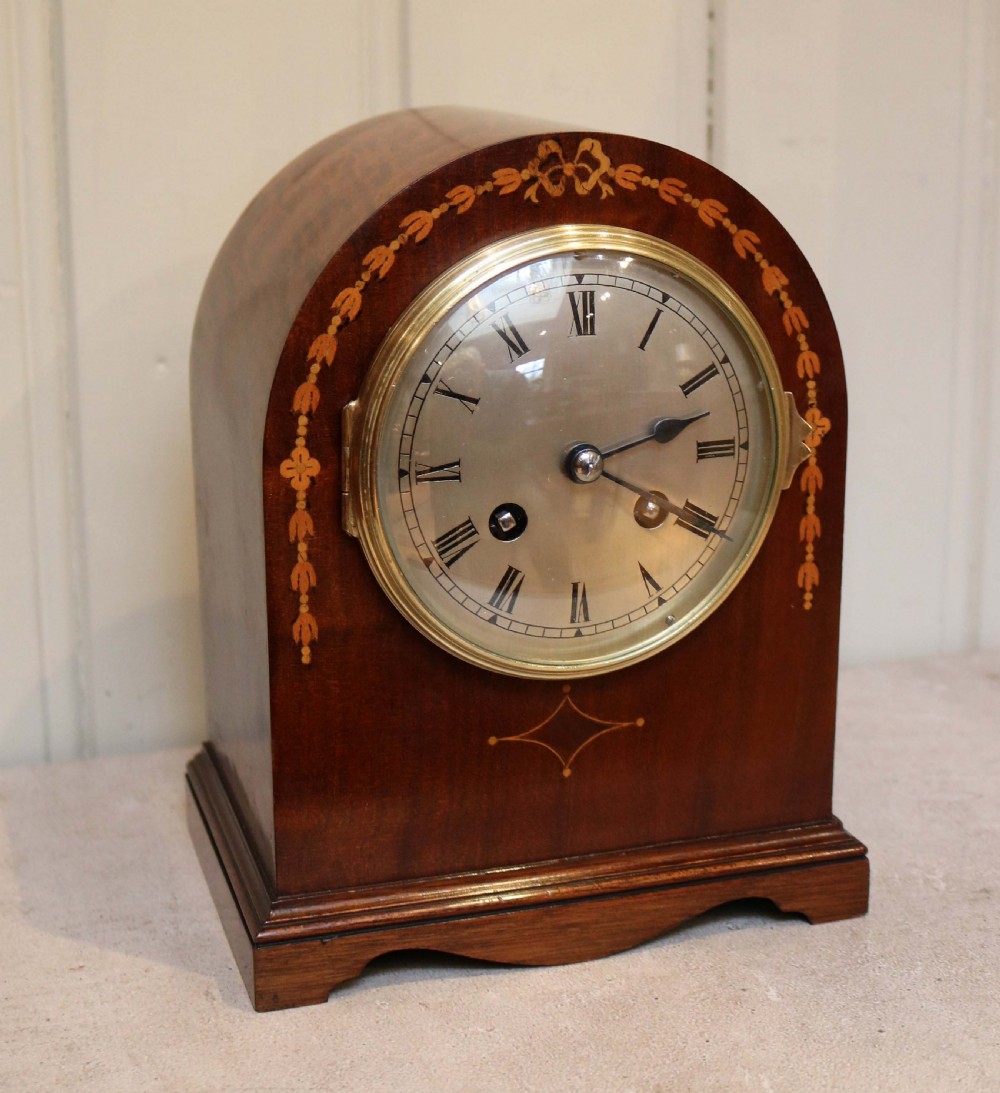 Small mahogany and Inlay Mantel Clock (France, c. 1910)