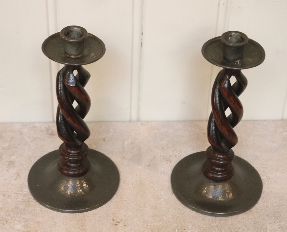 Pair Of Liberty & Co Tudric Pewter And Oak Candlesticks
