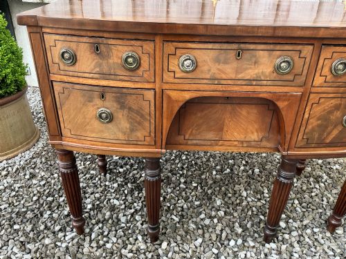 A REGENCY BOW FRONT SIDEBOARD - ADDITIONAL PHOTO 1