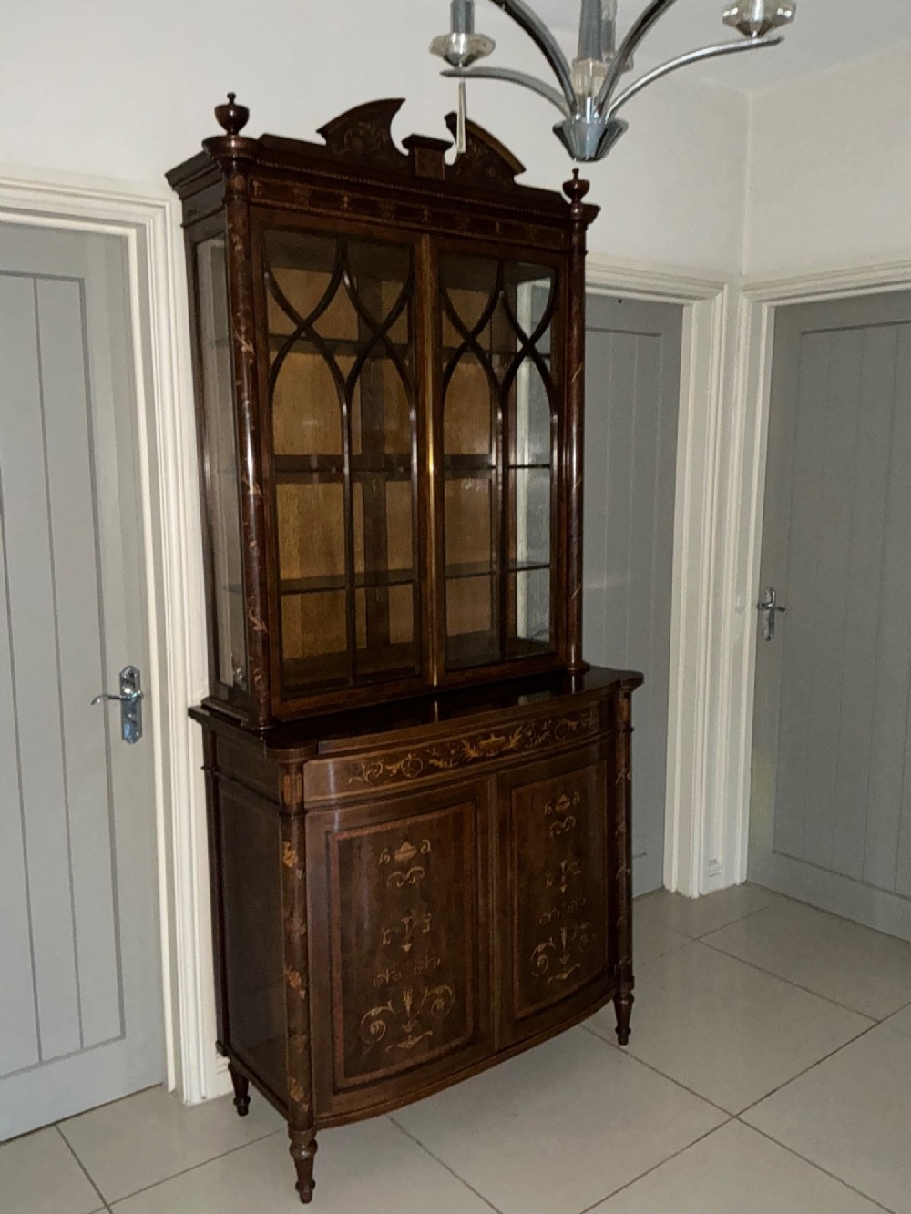 Superb bow fronted inlaid bookcase cabinet