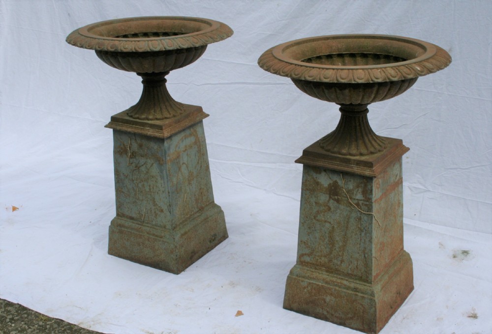pair cast iron urns 
