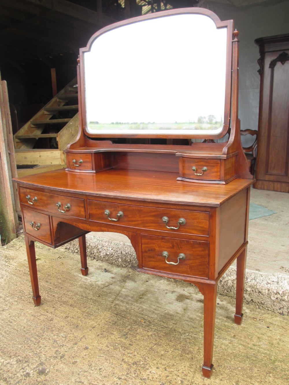 Edwardian mahogany bow front dressing table with large bevel mirror View II