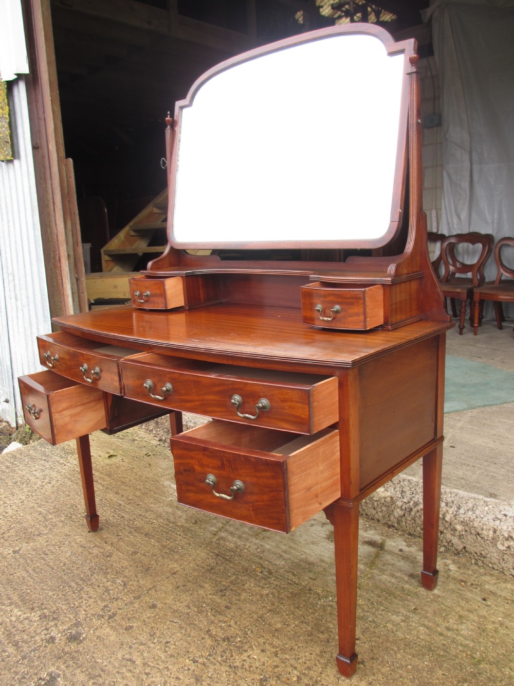 Edwardian mahogany bow front dressing table with large bevel mirror View X