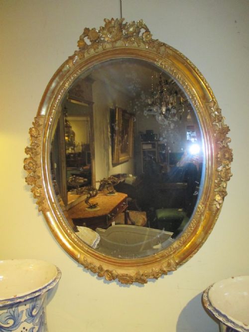 Large Oval Carved Gilt Wood Mirror