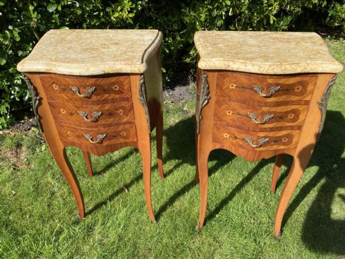 A Pair of French Marquetry Bedside Tables