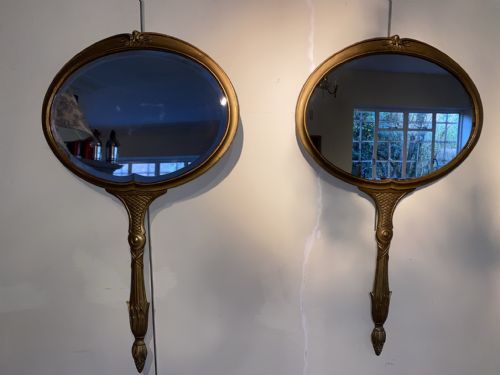 A Pair of Italian Gilded Metal Looking Glass Mirrors