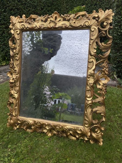 Carved Giltwood Cushion Mirror