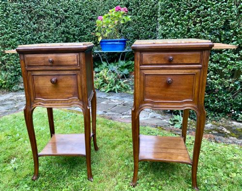 A Pair of French Bedside Tables in Walnut