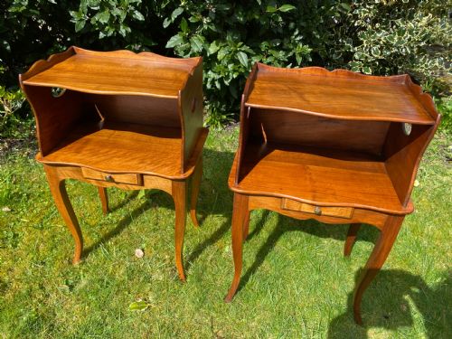 A Pair of Walnut Bedside Tables