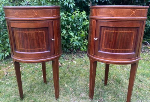 Pair of Oval Mahogany Inlaid Bedside Tables