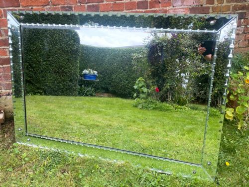 A Large Venetian Cut Glass Mirror