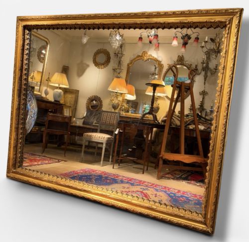 VERY LARGE CARVED GILTWOOD MIRROR
