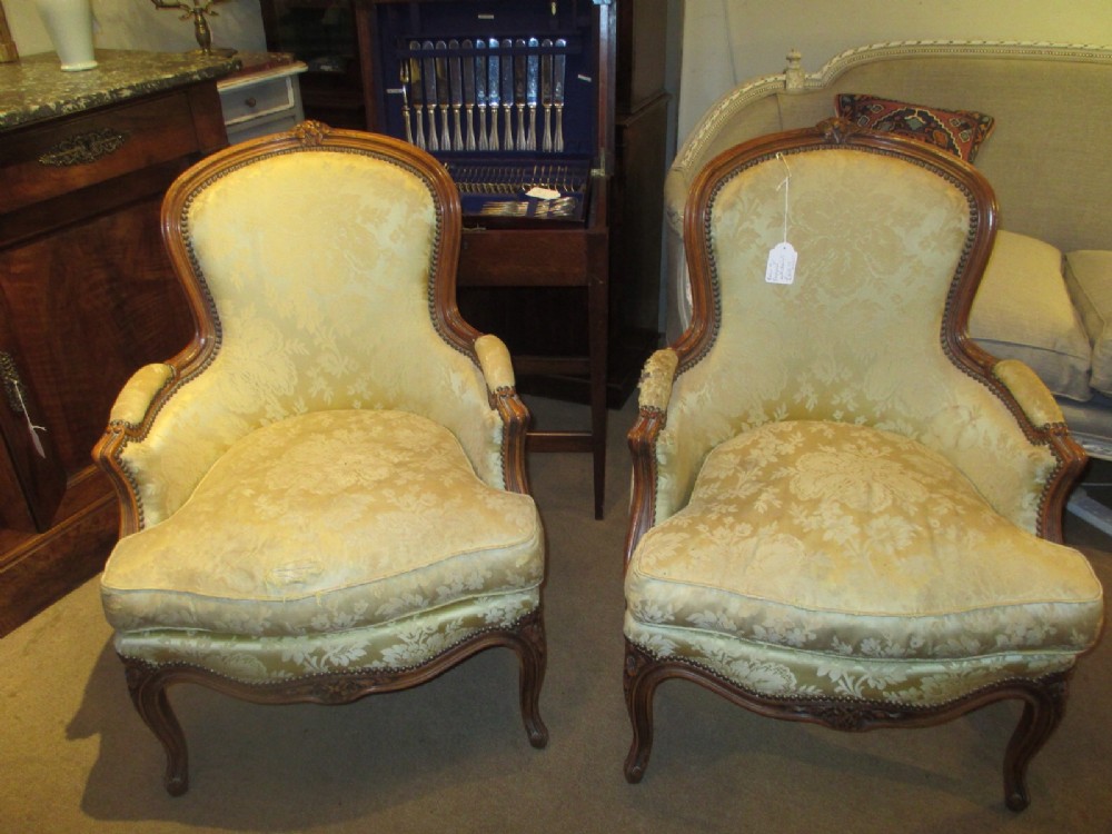 Pair of French bergere armchairs
