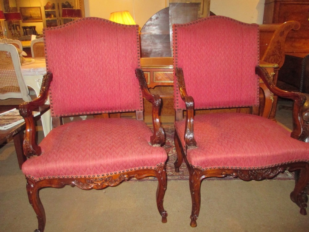 Pair of large walnut armchairs
