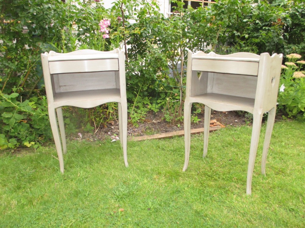 Pair of French painted bedside tables