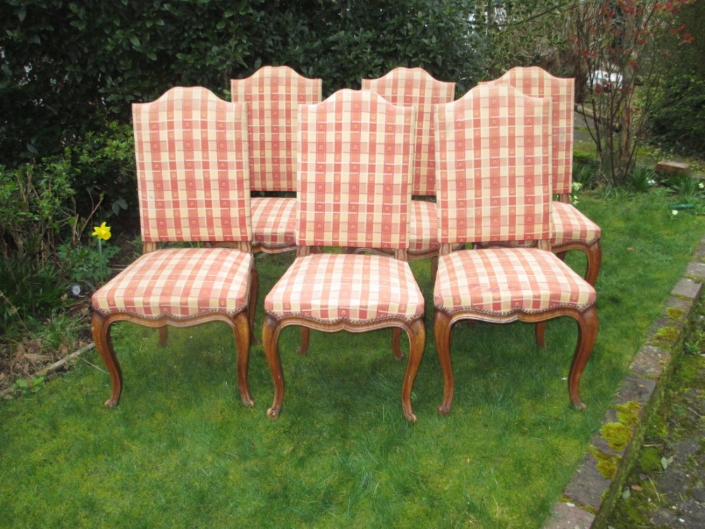 Six high back walnut dining chairs