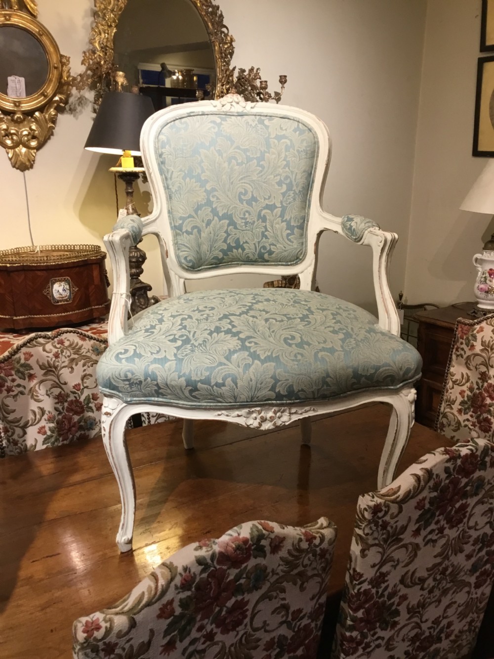 A pair of pretty French open armchairs  View III