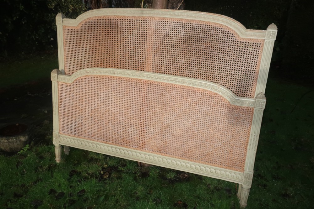 Kingsize caned bed