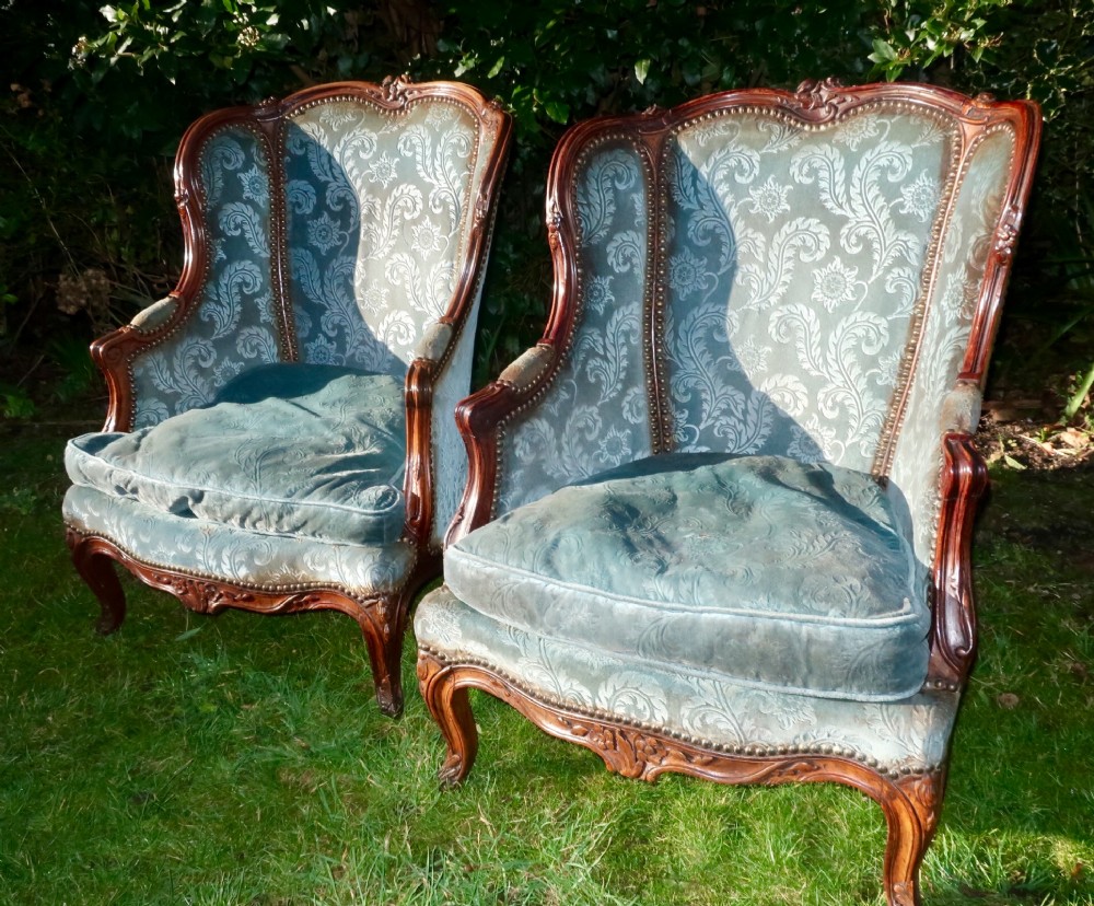 Pair of small walnut Bergere armchairs 