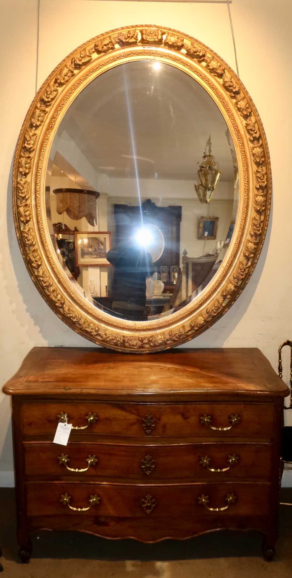 Very large gilt oval mirror 