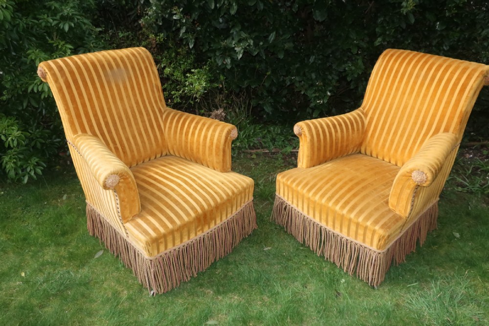 Large pair of French scroll back armchairs 