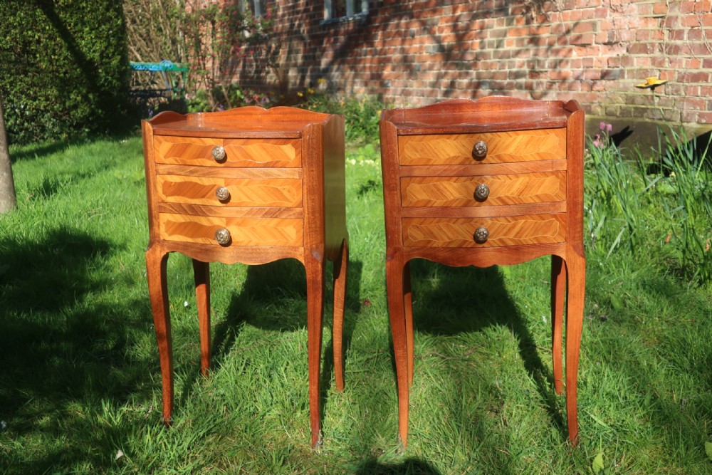 Pair of French tulipwood bedside tables