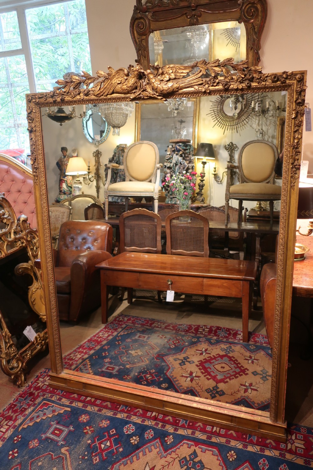 Large gilt mirror with lovebirds 