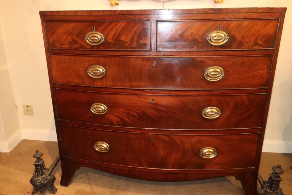 Flame mahogany bow fronted chest of drawers 
