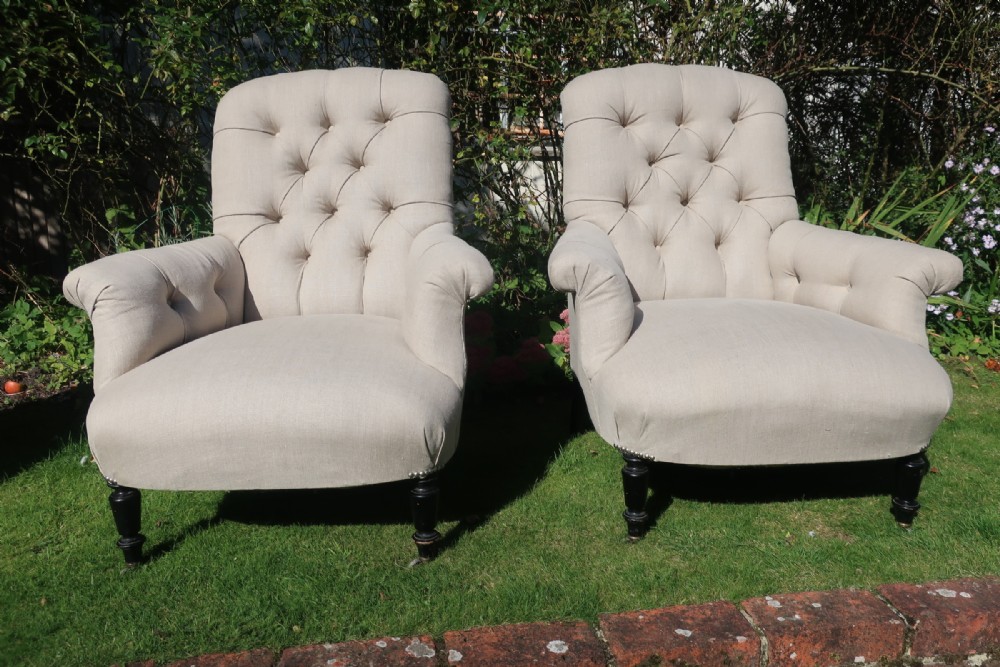 Pair of large button back armchairs 
