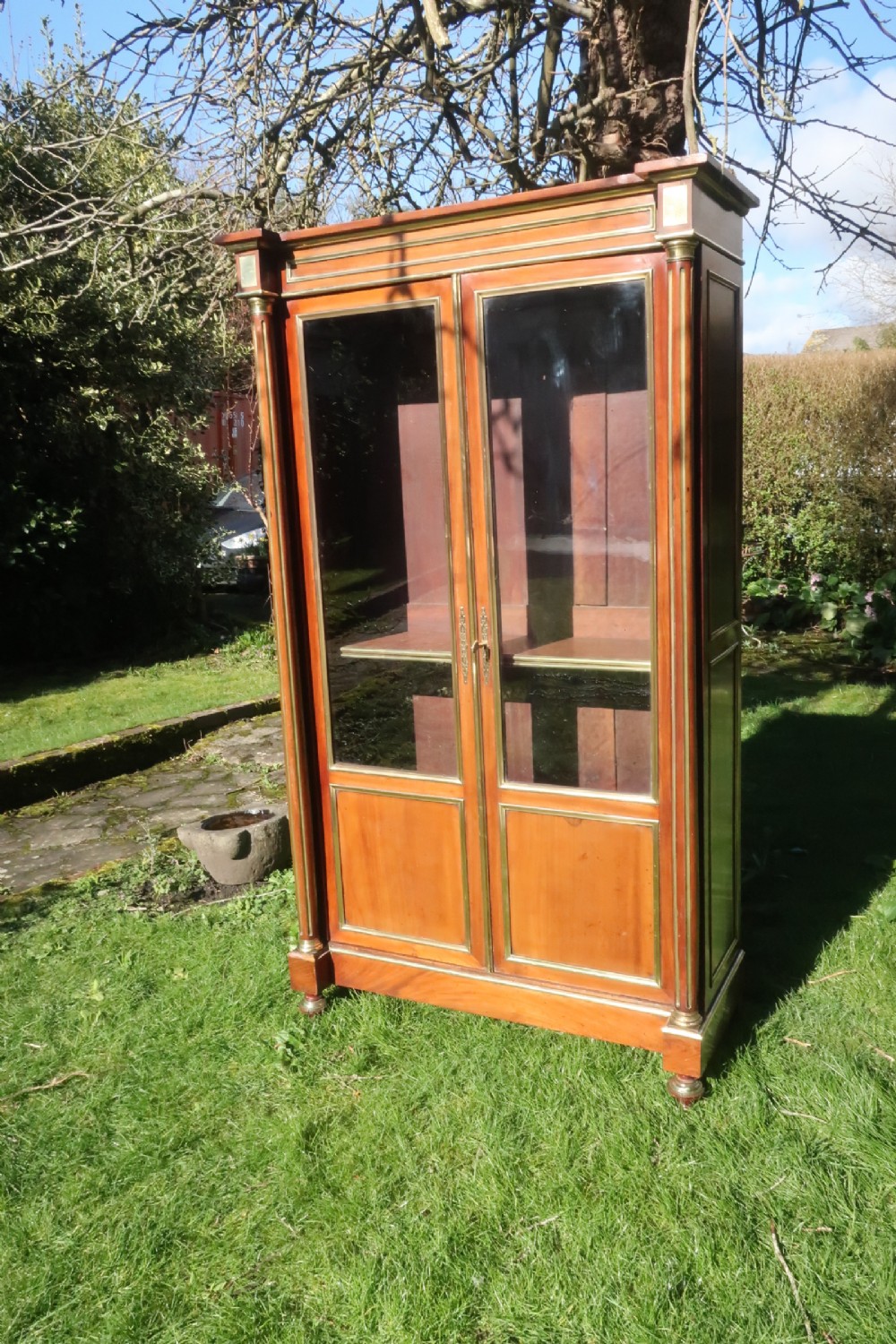 Brass inlaid mahogany bookcase 