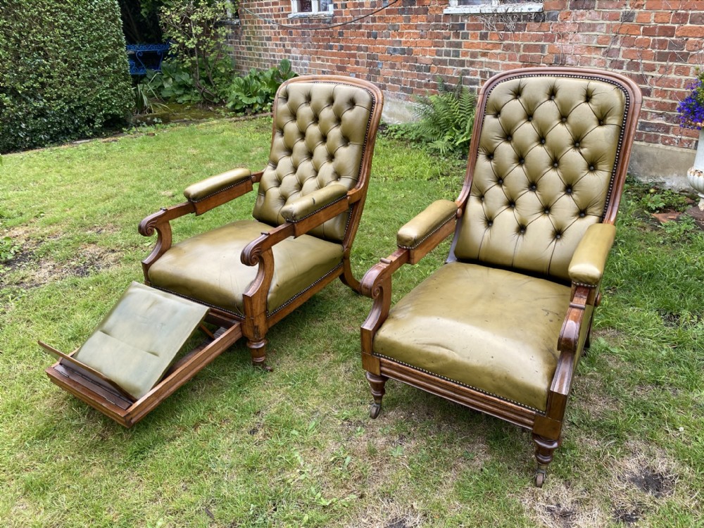 Matched pair of large leather reclining library chairs 