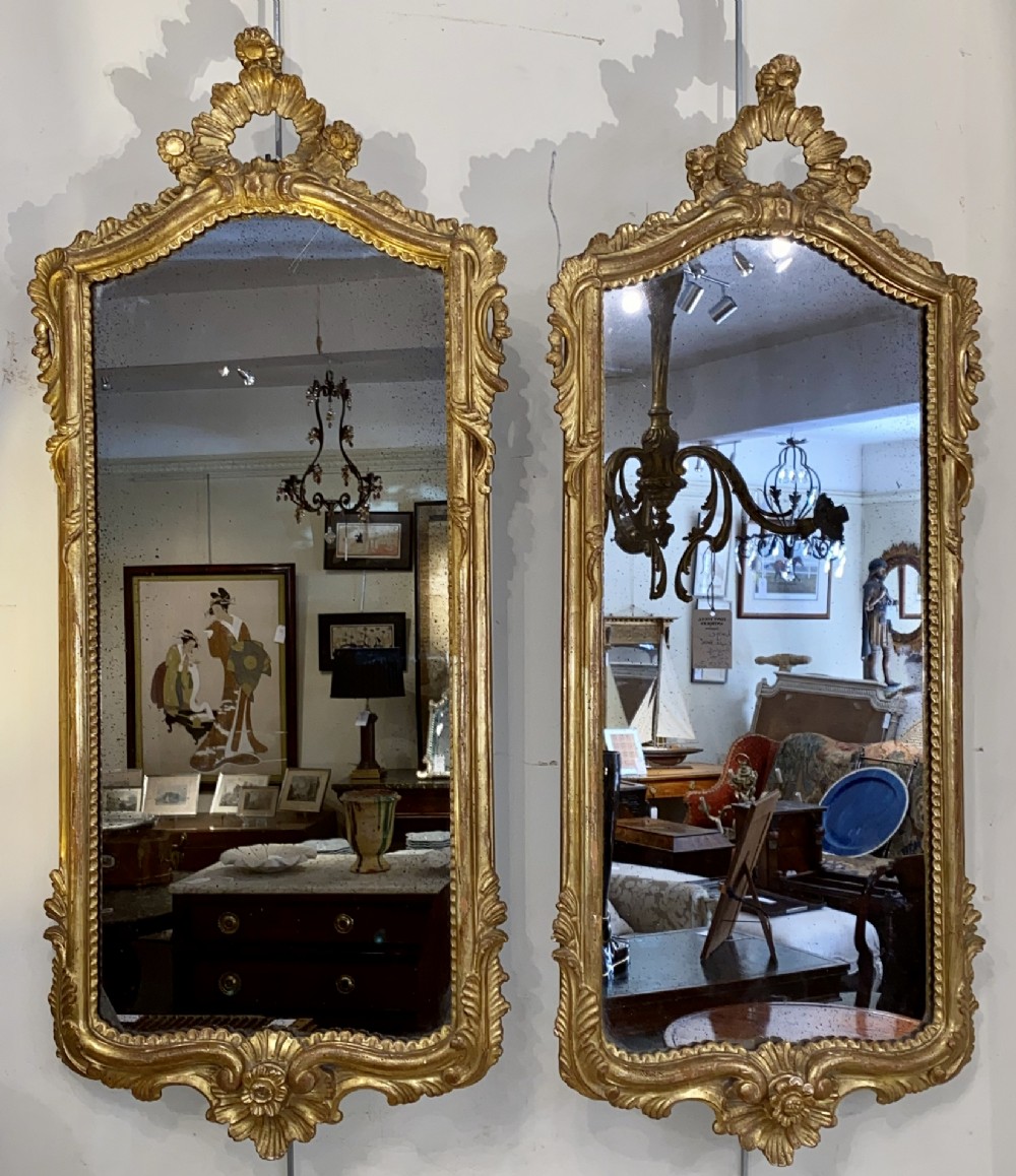 Pair of Venetian carved giltwood mirrors