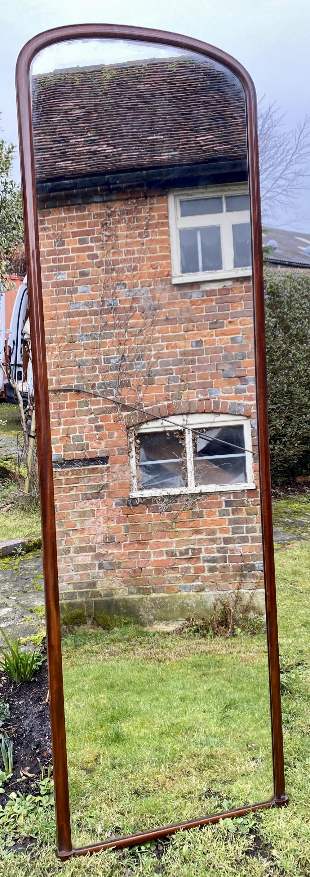 Very large arched top mahogany mirror 