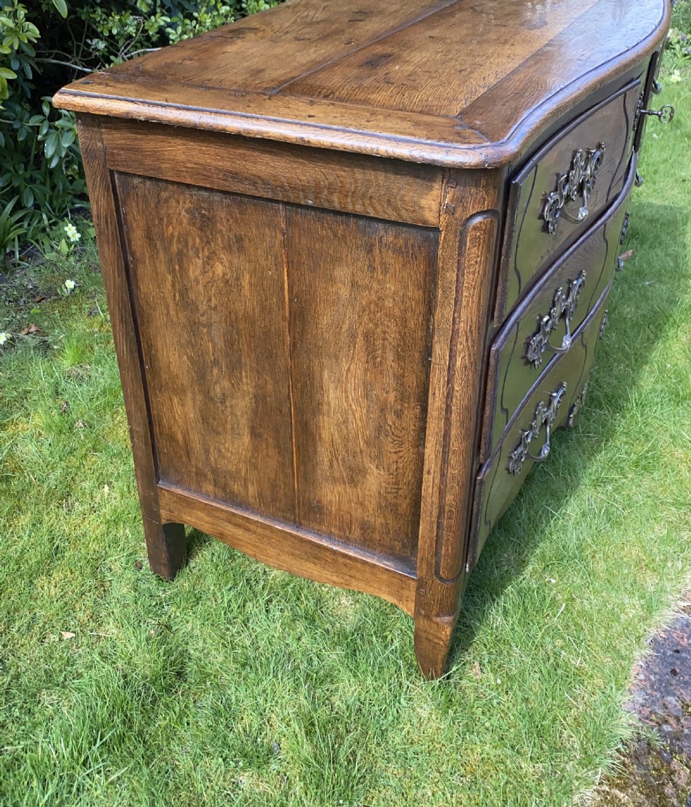 Louis XV serpentine fronted commode in oak  View VI