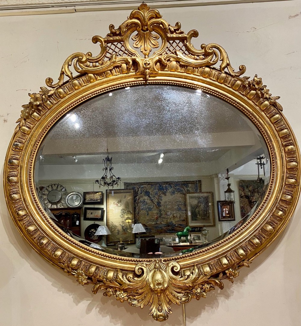 Large oval gilt mirror 