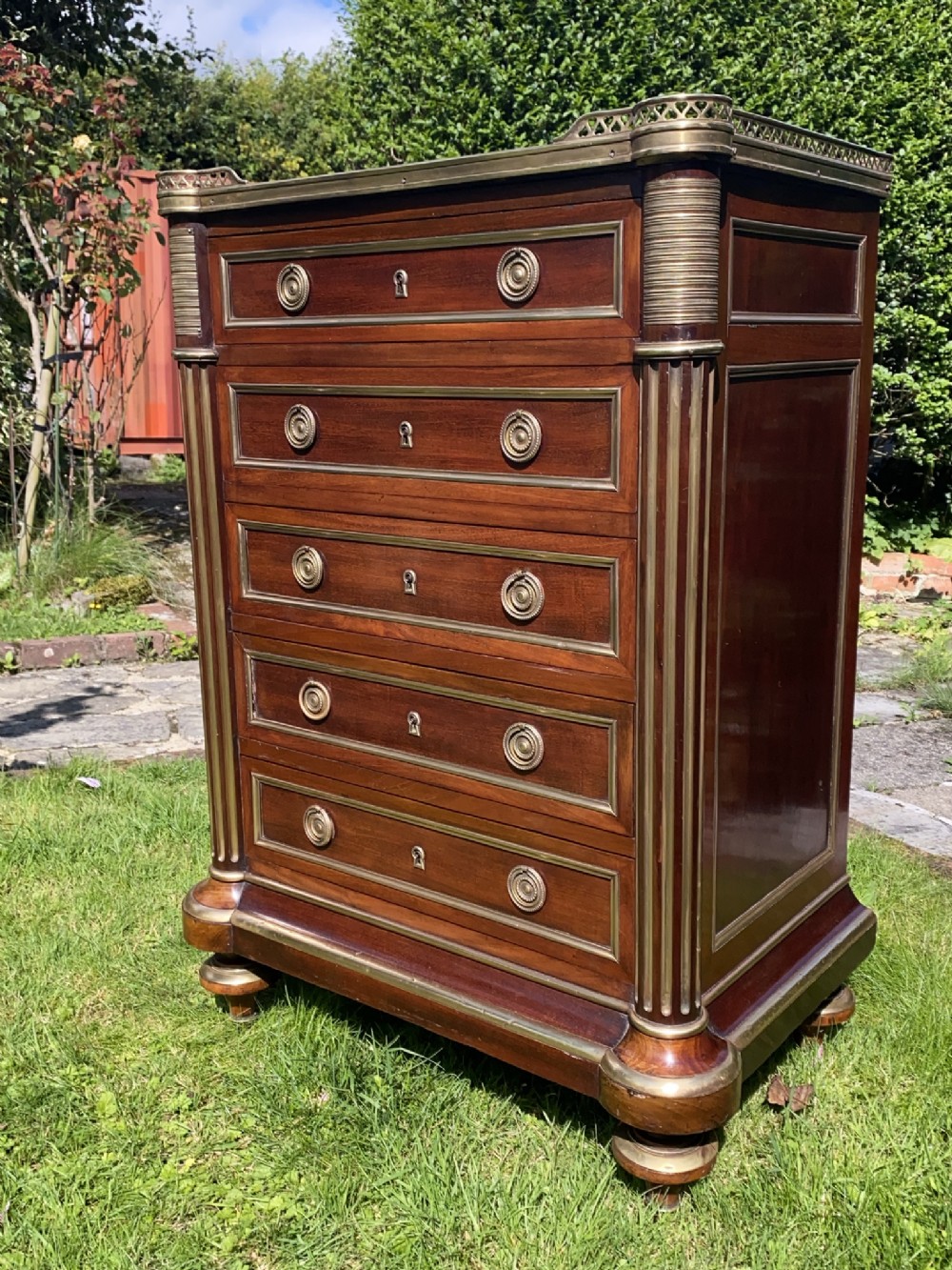 Brass inlaid mahogany commode 