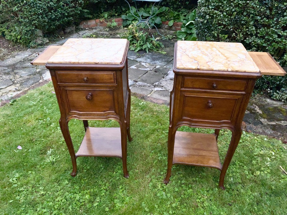 A pair of French bedside tables in walnut  View IV