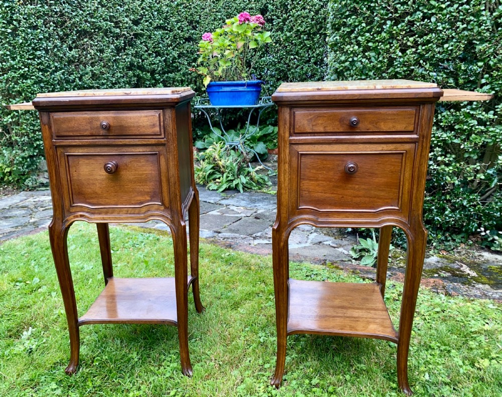 A pair of French bedside tables in walnut  View V