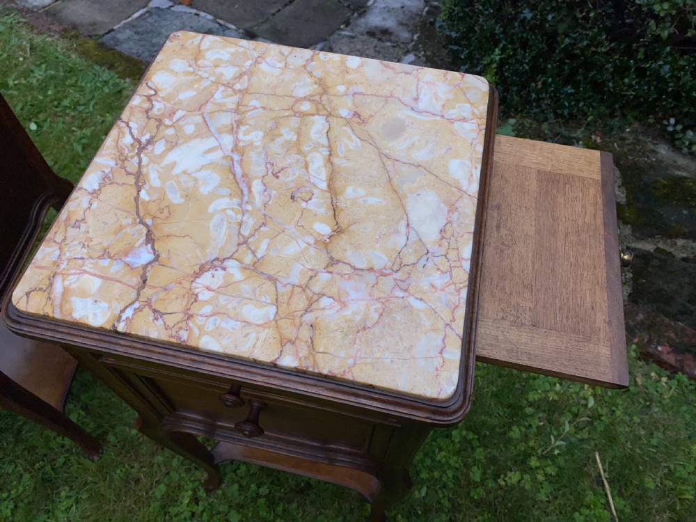 A pair of French bedside tables in walnut  View VI