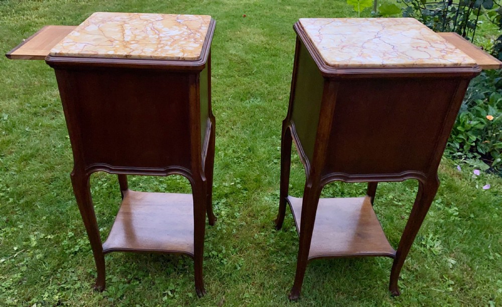 A pair of French bedside tables in walnut  View VII