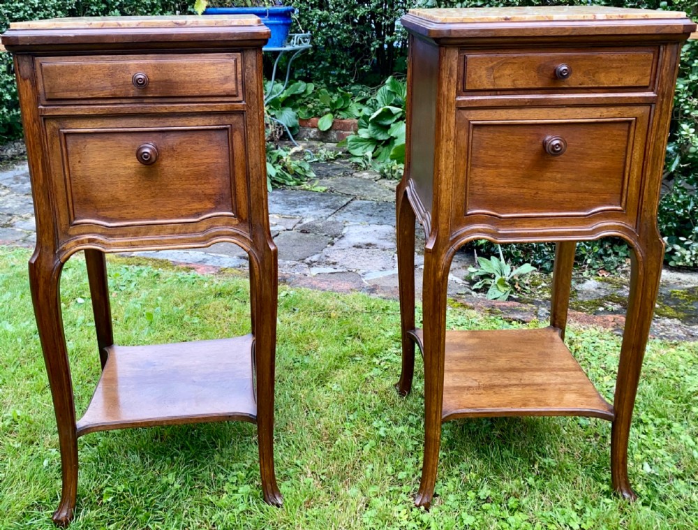 A pair of French bedside tables in walnut  View VIII