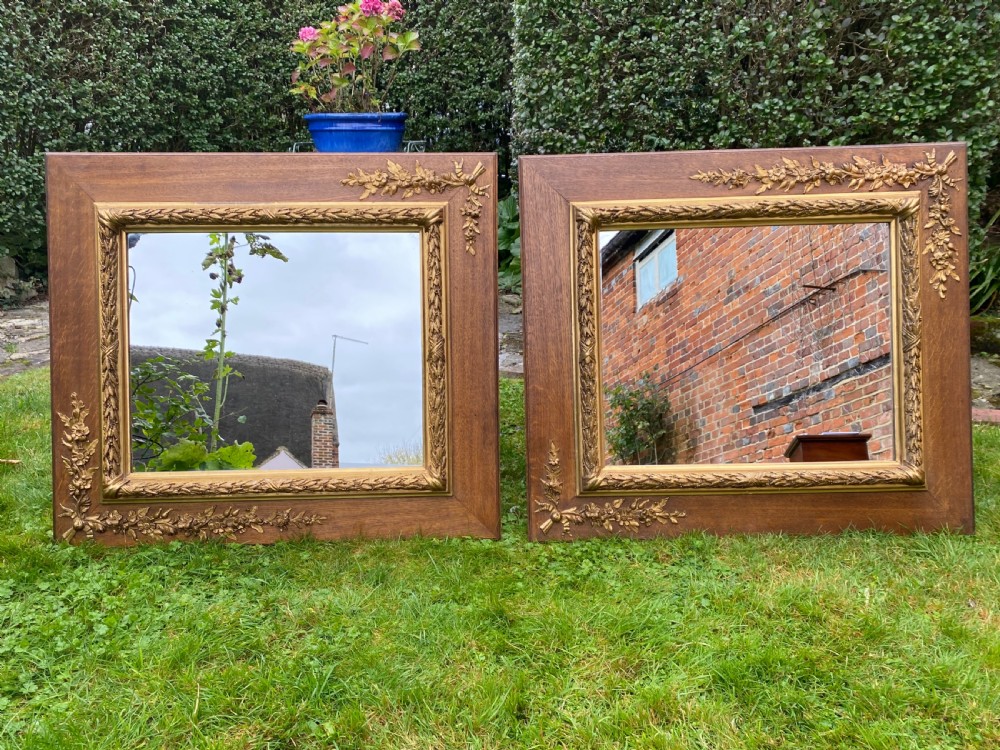 Pair of oak and gilt mirrors 