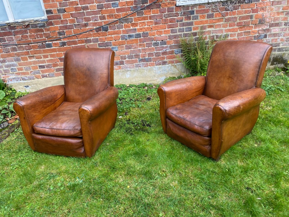 Pair of French leather club chairs  View XII