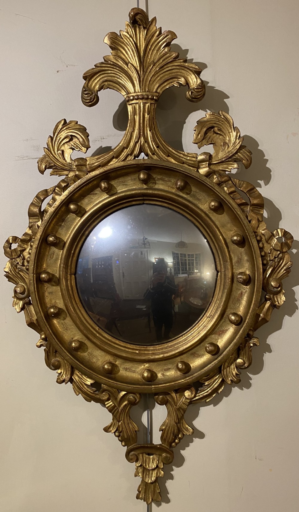 Carved gilt wood convex mirror 