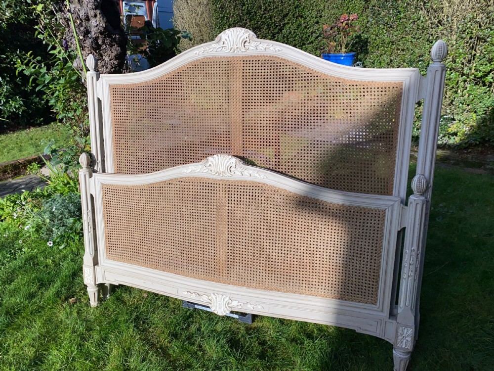 Kingsize caned and painted bed