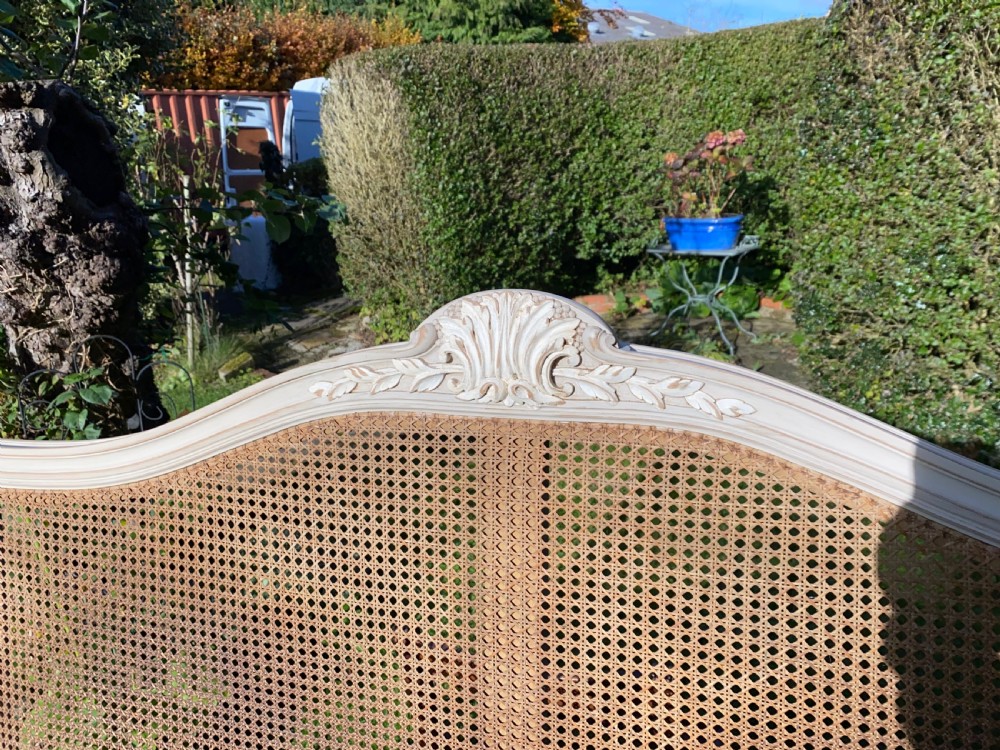 Kingsize caned and painted bed View II