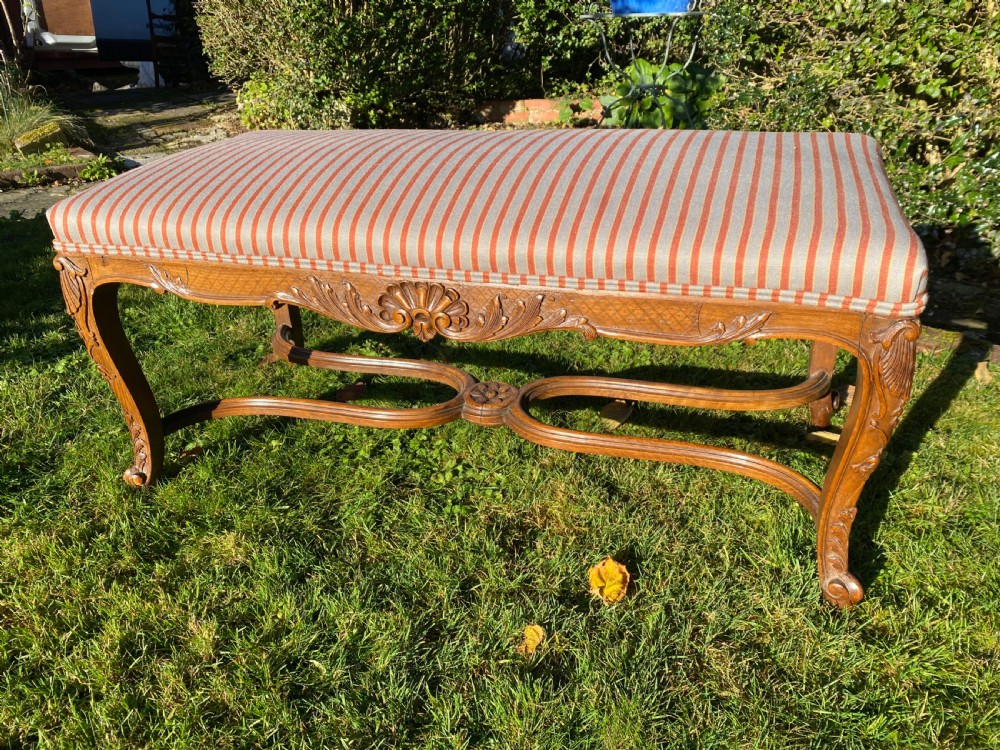 Carved walnut stool