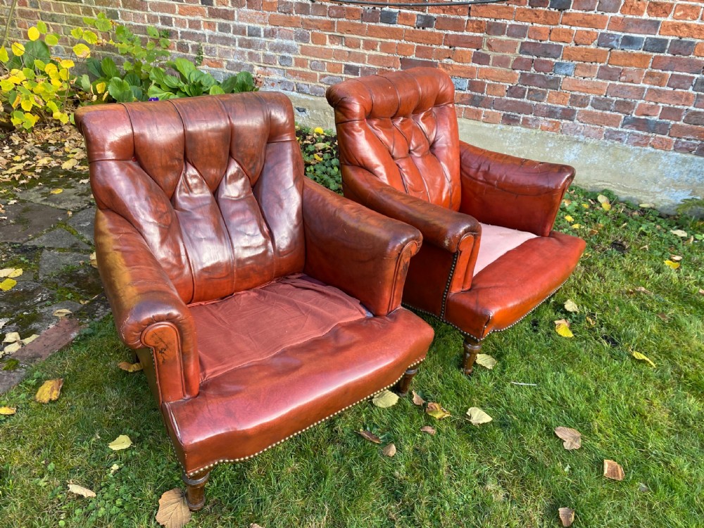 Pair of leather button back armchairs  View V