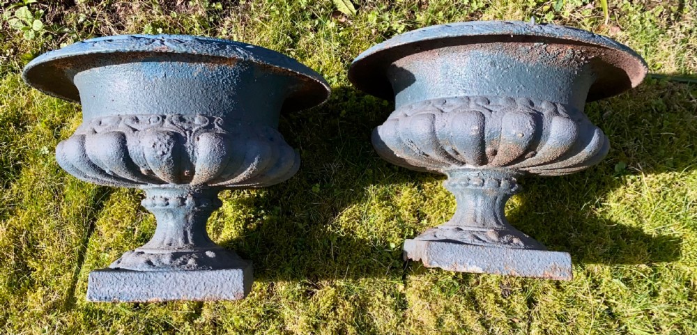 Pair of painted cast iron urns View II