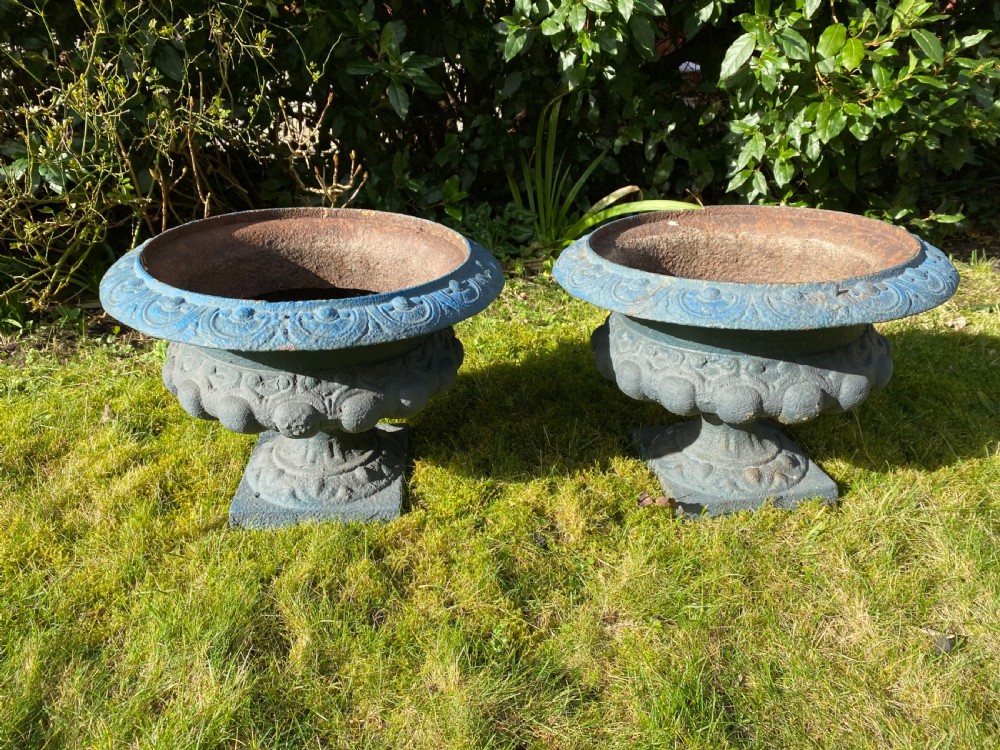 Pair of painted cast iron urns View IV